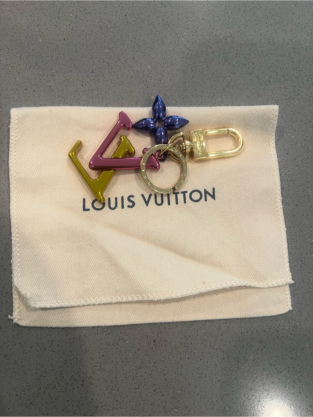 Louis Vuitton portocle wave Monogram Key Charm